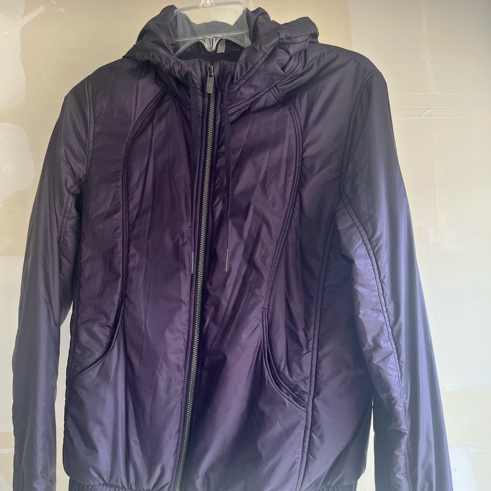 Lululemon bomber/puffer jacket with interchangeable fur collar line.
